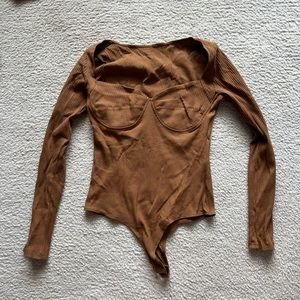 Brown body suit